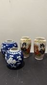 Group of four Japanese miniature porcelain vases