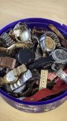 Large collection of unsorted wristwatches