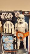 Three boxed Star Wars action figures