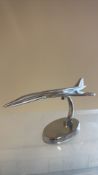 Chrome medium Concorde on stand