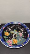 Chinese enamelled porcelain peacock charger