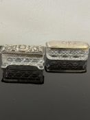 Silver topped glass dressing table trinkets x2.