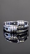9ct White Gold ring set with black stones Weight 4