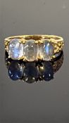 9ct Gold ring set with four oval cabochon moonston