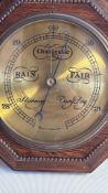 Pair of English barometer and London Clock Company skeleton clock