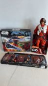 Group of boxed Star Wars action figures and vehicle, Hasbro