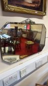 Octagonal frameless wall mirror with bevelled edges, stepped chrome mount and suspension chain,
