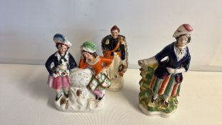 Three Victorian Staffordshire earthenware figurines
