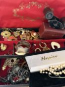 Box of costume jewellery to include silver napkin