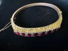 Early 20th century 9ct rose gold bangle set with 9