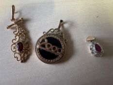 3 9ct gold pendants