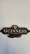 Cast guiness sign
