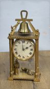 Imhof Swiss brass striking figural table clock, currently ticking and striking on bell (height