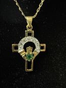 9ct gold pendant suspended on a 9ct gold curb chai