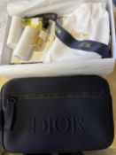 Box of Dior samples together with a Dior perfume b