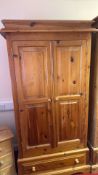 Pine two-door wardrobe with drawer
