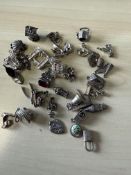 Collection of silver charms 88g