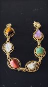 Gold-tone multi-gemstone link bracelet