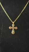 9ct Gold & cross pendant, pendant set with 5 garne