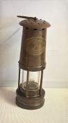 Brass miners safety lamp by E. Thomas & Williams
