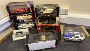 Group of boxed 1:18 die-cast model cars