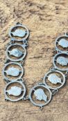 British cut-coin silhouette link bracelet