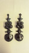 Pair of carved wooden items