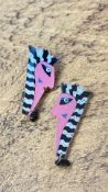 Pair of acrylic stylised face earrings