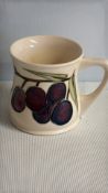 Moorcroft Pomegranate pattern tube lined mug