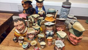 Collection of character and Toby jugs with beer steins