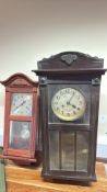 Pair of wooden pendulum wall clocks