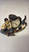 Resin novelty mantel clock with workmen figures