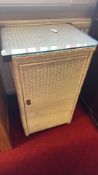 Wicker cabinet with glass top