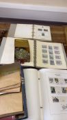 Stamp accumulation in albums, envelopes and tin