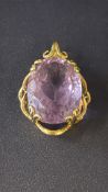 9ct Gold pendant set with amethyst Weight 5.5g