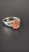 9ct Gold ring set with oval orange gemstone Weight