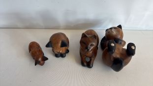 Set of 4 carved wooden cat figurines