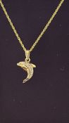 9ct Gold dolphin pendant on gold plated chain. Wei