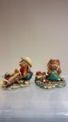 Pair of Pendelfin stonecraft rabbit figurines, ‘Woody’ pushing a wheelbarrow and ‘Gramps’ with