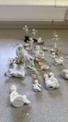 Collection of miniature porcelain cherub and animal figurines
