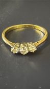 18ct Gold ring set with 3 diamonds Weight 1.5g