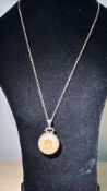 Silver chain &pendant, pendant set with fossil