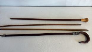 Walking stick, cane and two yard sticks