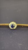 9ct Gold pin brooch set with central sapphire & di