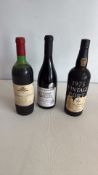 Three bottles of vintage wine and port