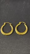 Pair of 9ct gold earrings Weight 1.5g