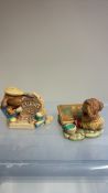 Pair of Pendelfin Studios hand-painted stonecraft rabbit event figurines, dated 1996 and 1998,