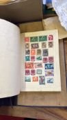 Boxed accumulation of world stamps, album pages and covers