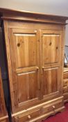 Pine double-door wardrobe with base drawers