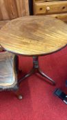 Pair of carved coffee and circular tripod tables